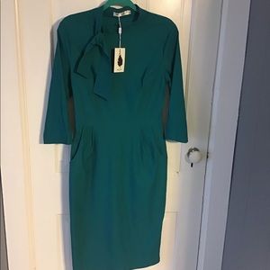 Very flattering NWT Tie Neck Dress with po…